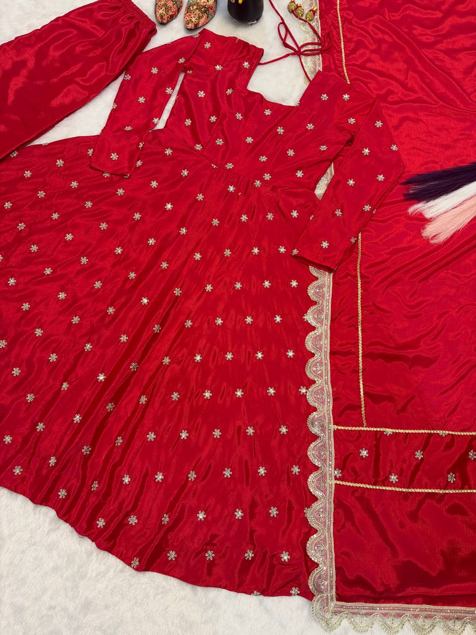 Radiant Crimson Red Flared Anarkali Suit Set Adorned with Delicate Silver Starburst Motifs and an Ornate Scalloped Dupatta